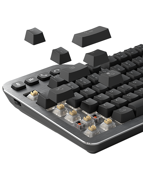 Key caps of mechanical keyboard floating away to show Kaihl Silent Tactile switches on Silent Mechanical Keyboard.