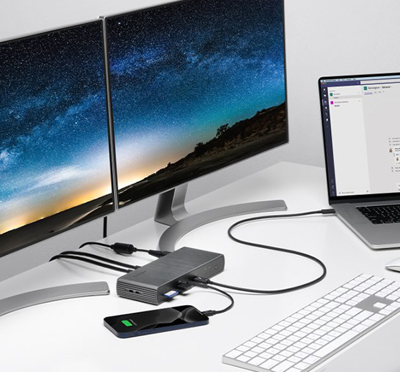 Modern MacBook workstation using the Kensington SD5780T Thunderbolt™ 4K/6K  Docking Station with up to 100W PD to charge a smartphone and connect to two external HD monitors.
