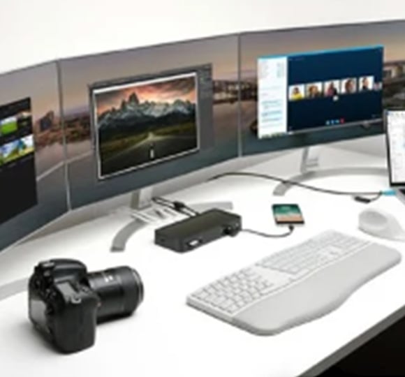 Modern triple monitor workstation featuring  the Kensington SD4782P USB-C® 4K Docking Station with 100PD as an option for M1 and M2 MacBooks.