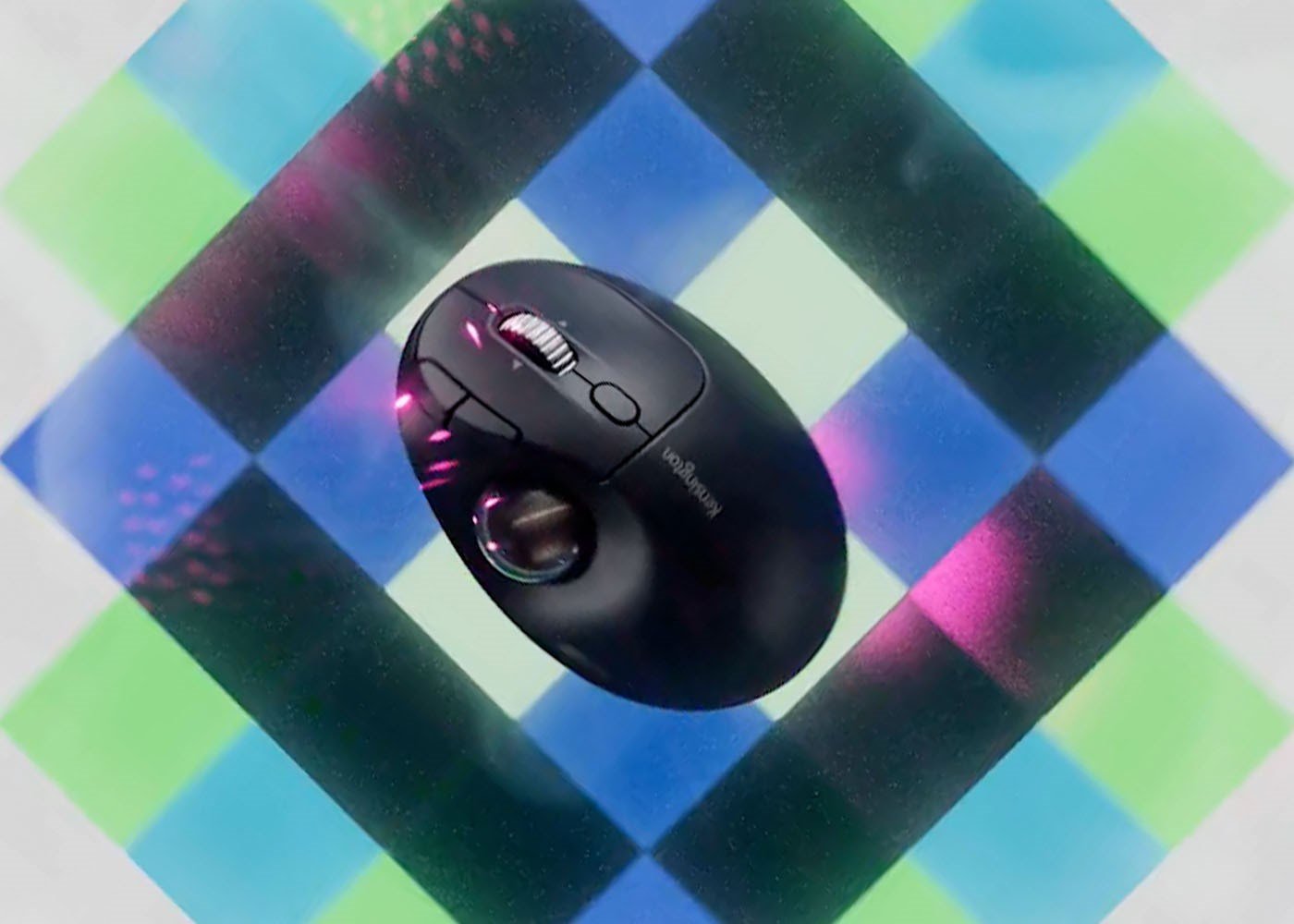 Top view of a trackball on multicolored squares.