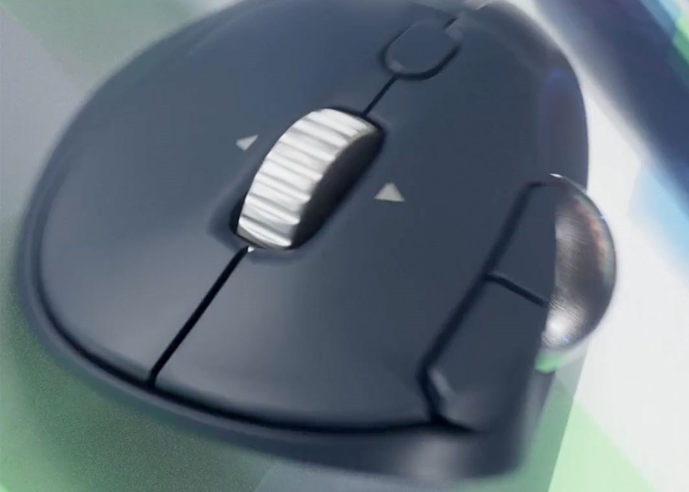 Close-up of a trackball with the focus on the scrolling ring .