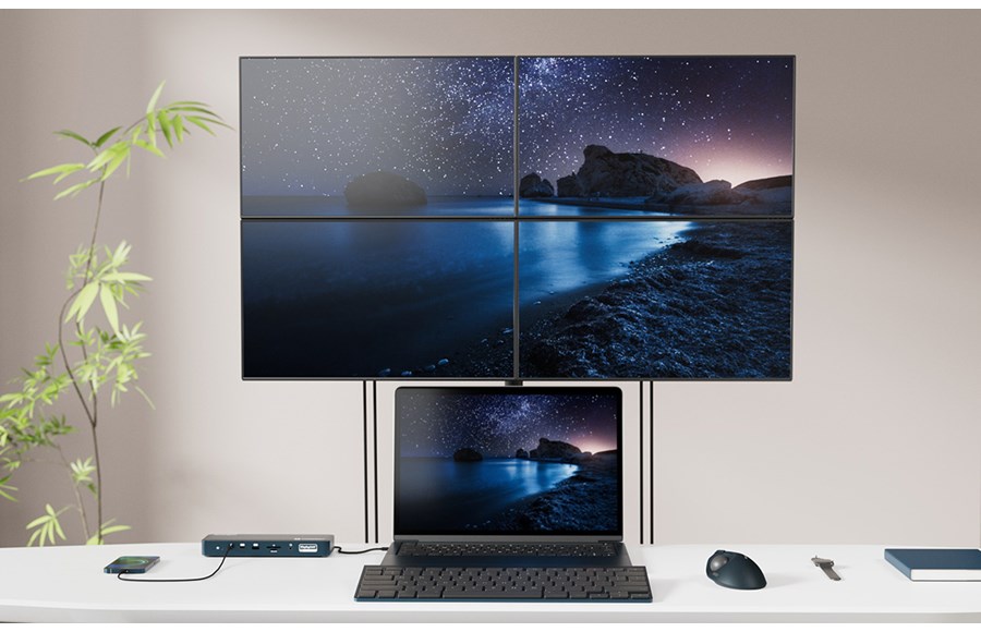 Quad 4k monitor and laptop connected to Kensington hybrid docking station featuring both Thunderbolt and DisplayLink technology.