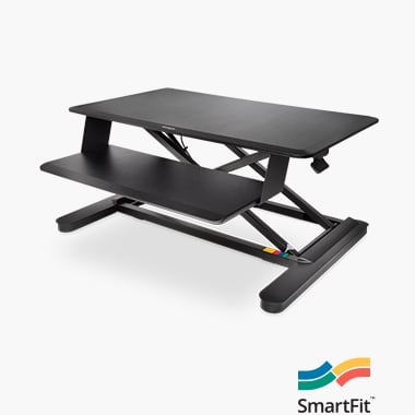 Ergonomic standing desks with a close up of the Kensington SmartFit® Sit/Stand Desk.